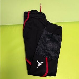 Kids Black Jordan Joggers with Red Accents